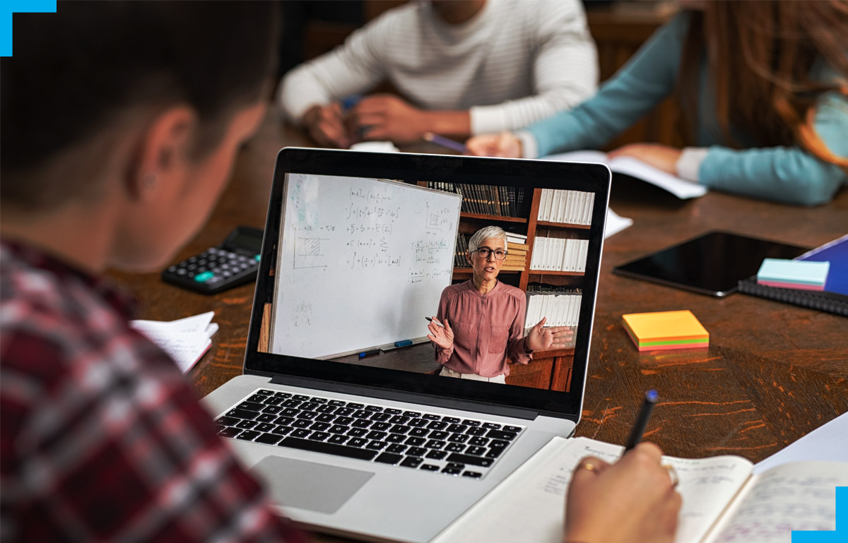 A person engaged in online learning on a computer screen, representing Mitr Learning’s Online Programme Design services, including course design, curriculum development, and content migration for effective eLearning